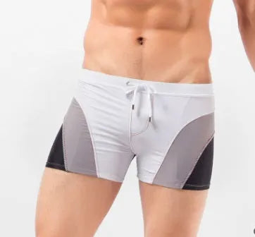 Men's anchor string swim shorts in solid colour with polyester and spandex fabric, adjustable drawstring waist, available in multiple sizes