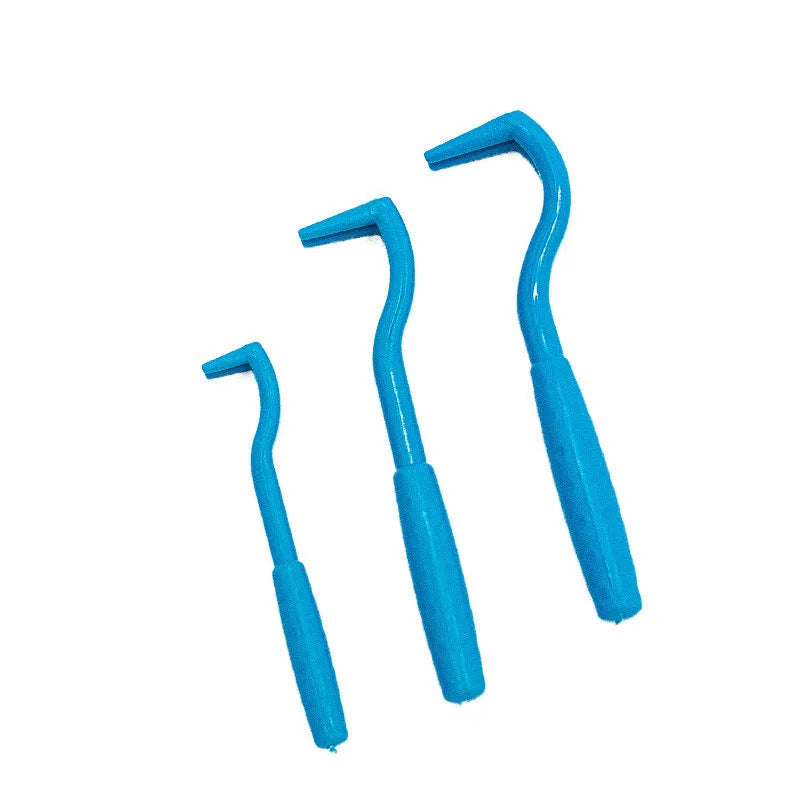 Set of three blue plastic tick removal hook tools for dogs and cats on a white background.