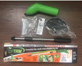 Cordless handheld grass trimmer with extension pole and protective shield on a garden lawn