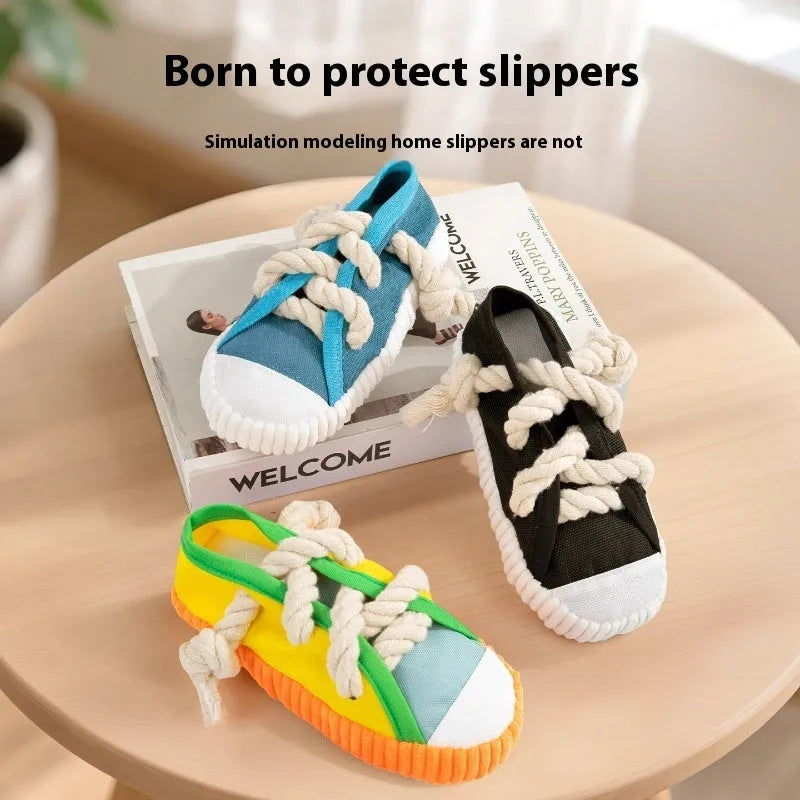 Plastic dog chewing toy with slippers design in choice of three colours for molar relief