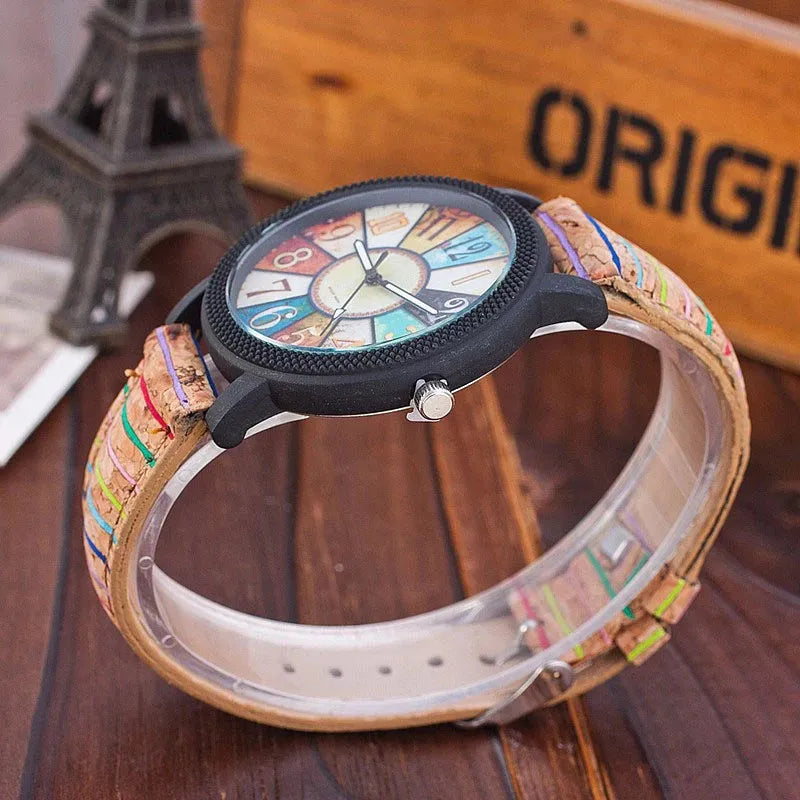 Casual vintage women's watch with brown leather strap and silver 37mm round dial.