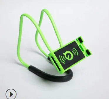 White plastic and foam 360-degree rotatable universal phone holder on a table.