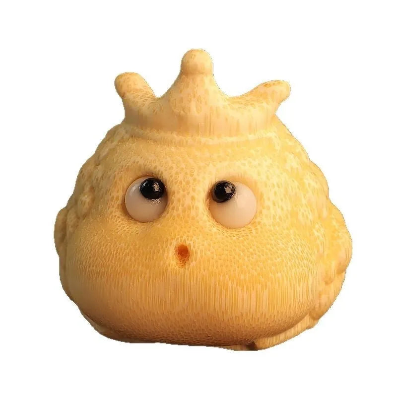 Solid bamboo carving of a cute Crown Princess Toad ornament with live eye detail.
