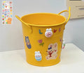 Round metal desktop pen holder in a choice of colours including green, pink, red, white, and yellow.