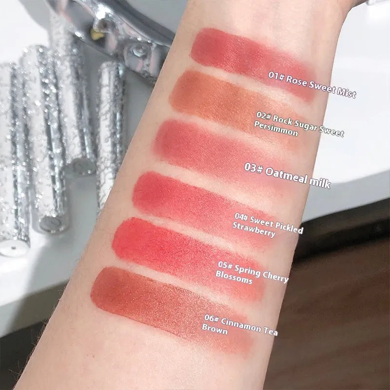 Velvet Mist Lip Mud Matte White Lipstick in six waterproof shades displayed in standard packaging