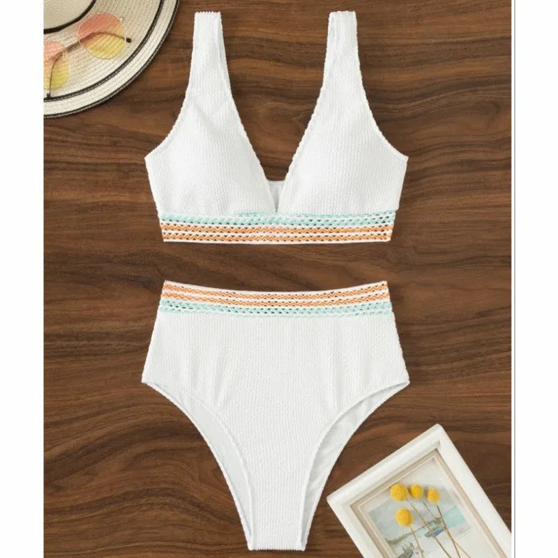 White high waist bikini set with sleeveless top on a mannequin