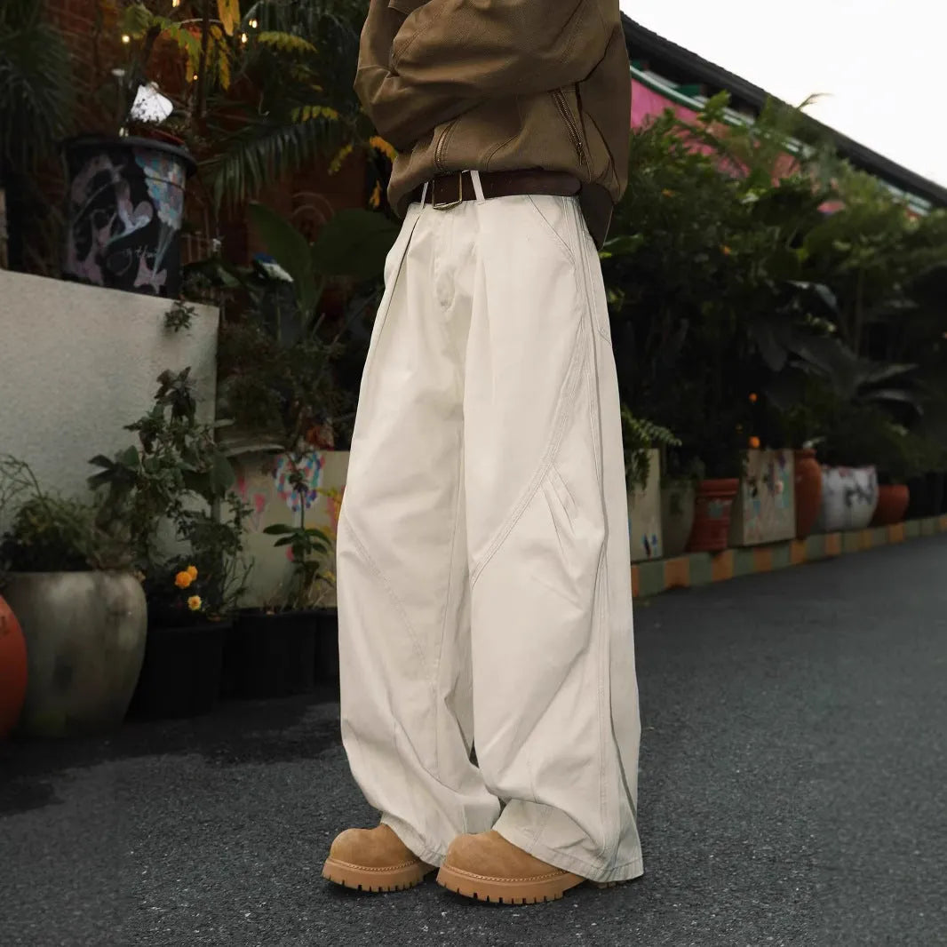 Men's straight leg pleated trousers in apricot colour with elastic waistband