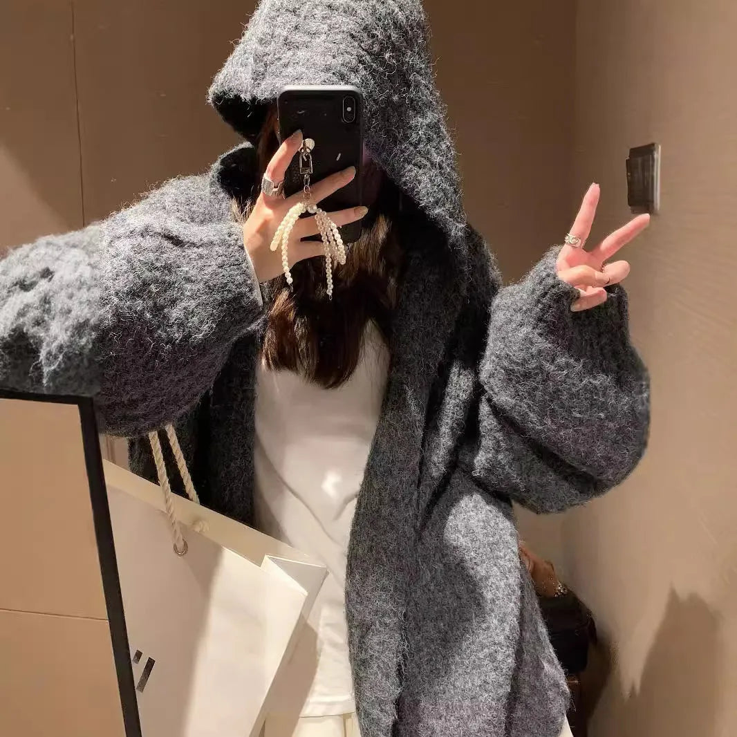 Women's thick hooded cardigan in loose fit, shown in dark grey, brown, and milky white solid colours.