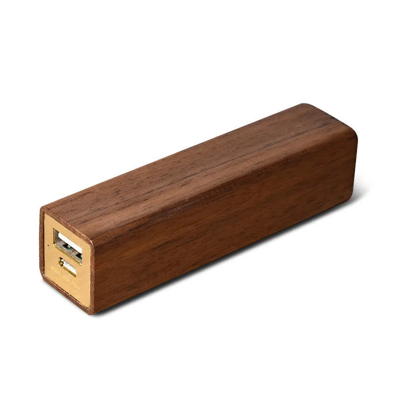 Brown walnut wood portable power bank with 2000mAh capacity and gift box packaging.