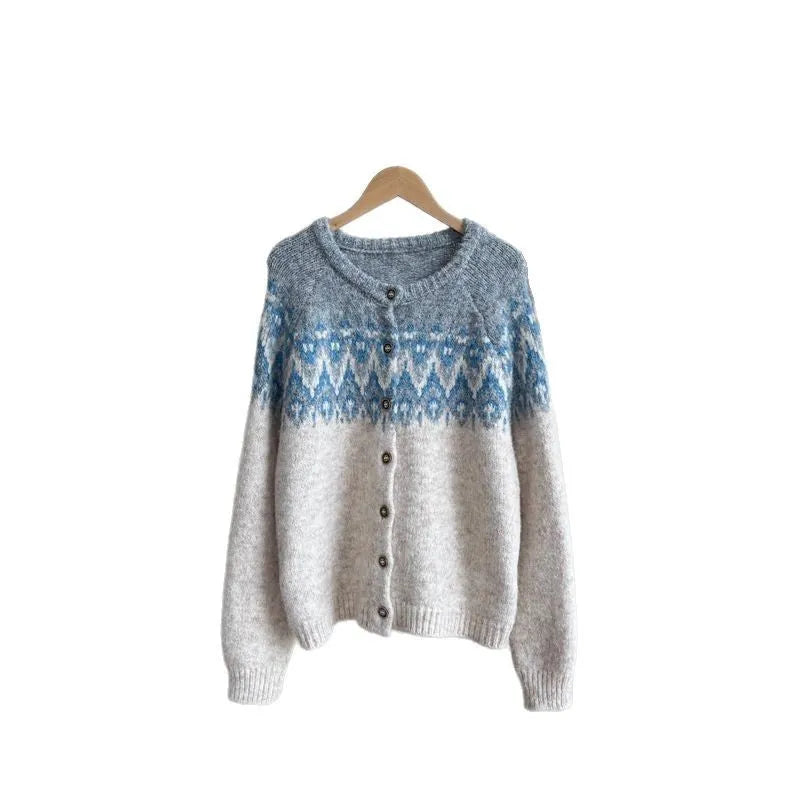 Women's loose-fit jacquard knit sweater coat in milky white, shown on a hanger.