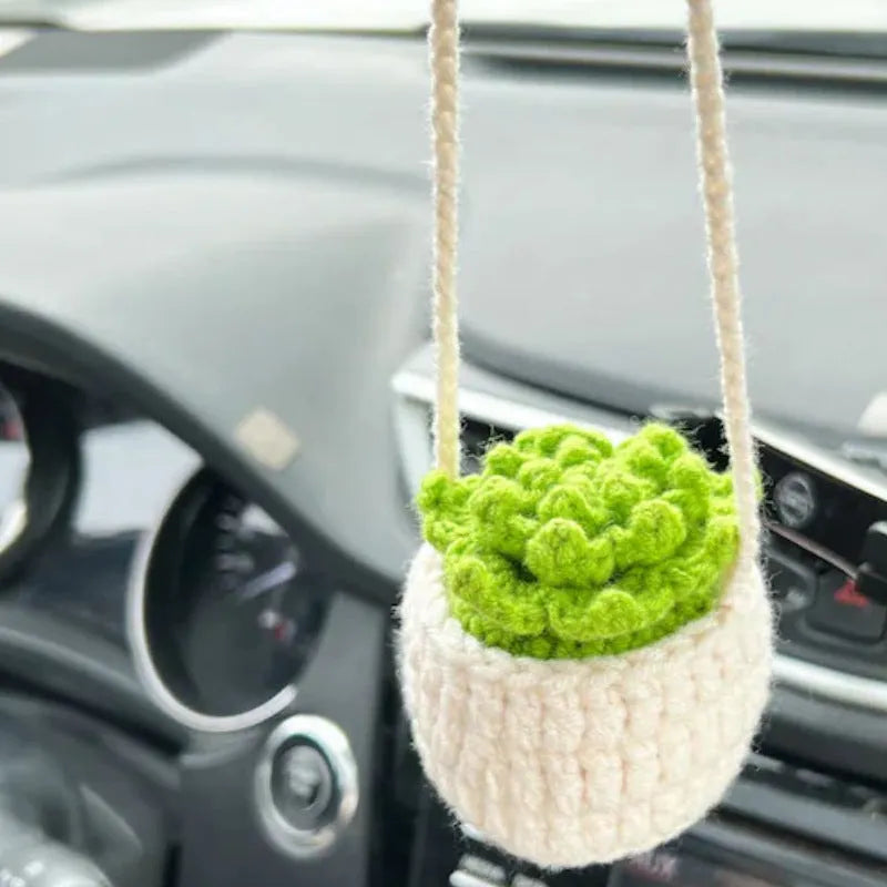 Green and white knitted car plant ornament with hanging rope for dashboard or mirror decoration