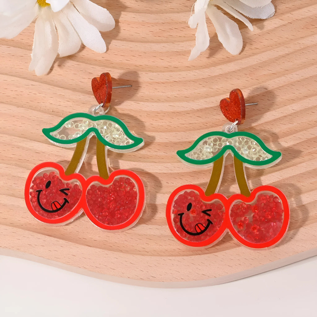 Colourful acrylic stud earrings with cherry, strawberry, watermelon, pineapple, coconut, cake, and ice cream designs.