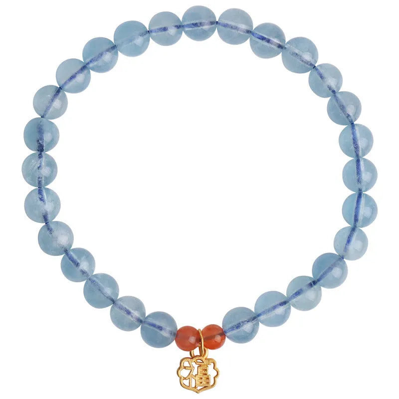 Women's ice translucent bracelet with 8mm crystal beads and a blessing card charm on a white background.