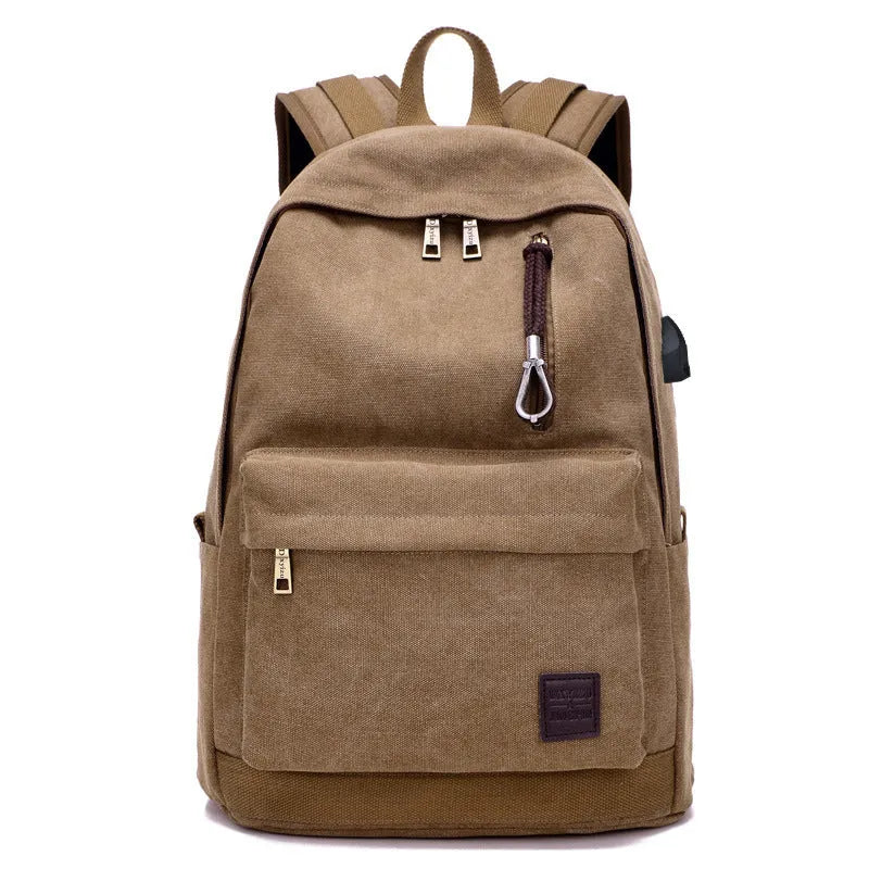 Coffee coloured canvas backpack with USB charging port and multiple zippered compartments