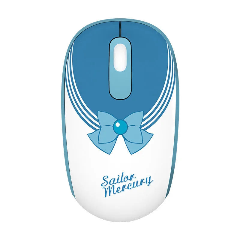 Pink Sailor Moon wireless mouse with USB receiver on a desk.
