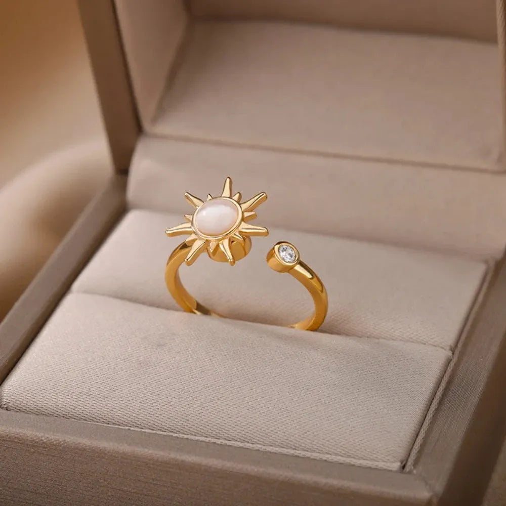 Gold and platinum coloured adjustable copper decompression ring with geometric rotatable design