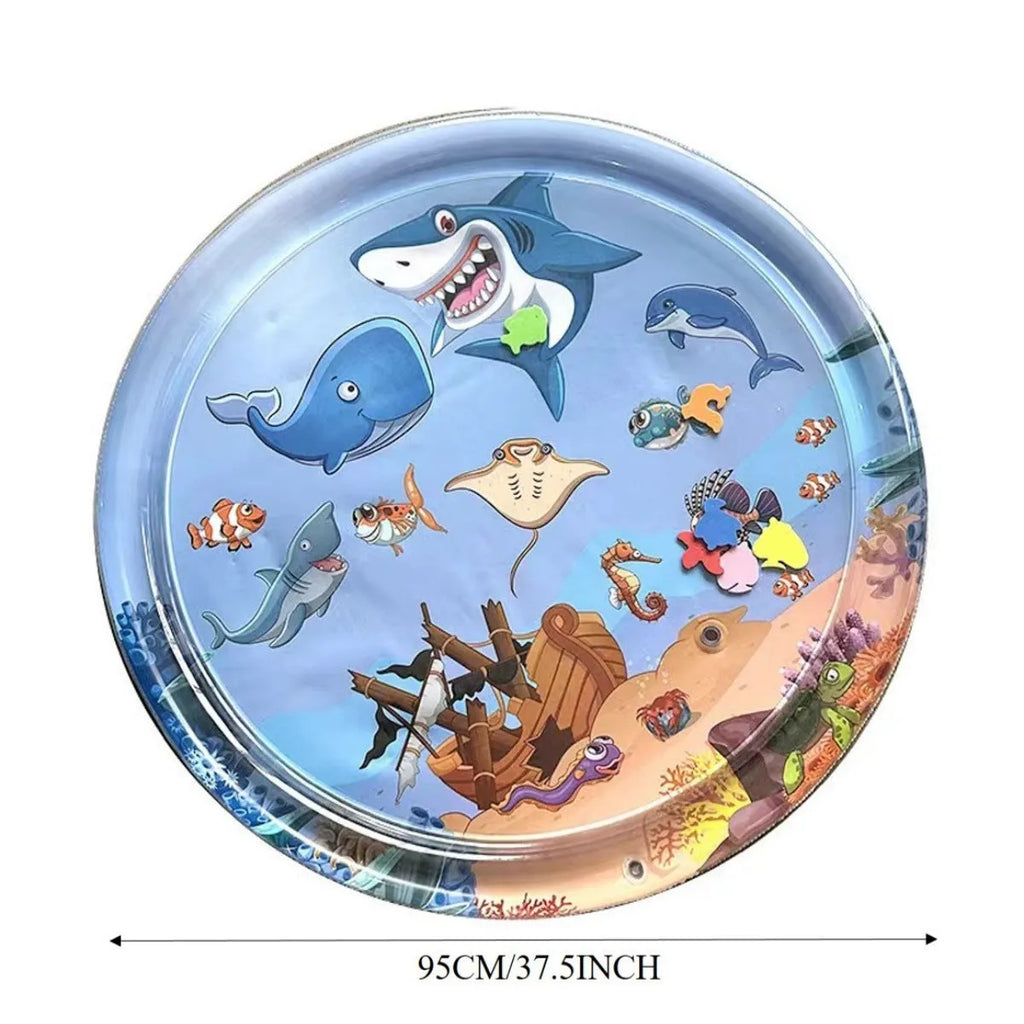 Square blue water sensory playmat for cats with floating fish toys inside, shown inflated on a floor.