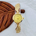 Slim stainless steel women's watch with round dial, shown in gold, black and gold, and white and gold colour variations.