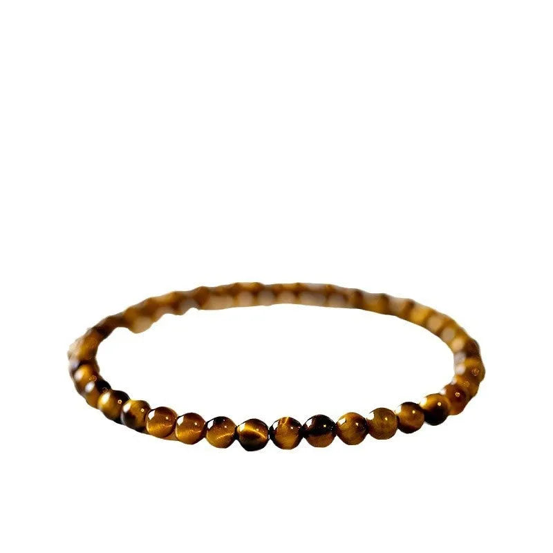 Tigereye stone bracelet with Chinese style geometric pattern in three bead sizes