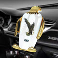 Eagle style wireless charging car phone holder with snap-on suction cup in black and gold.