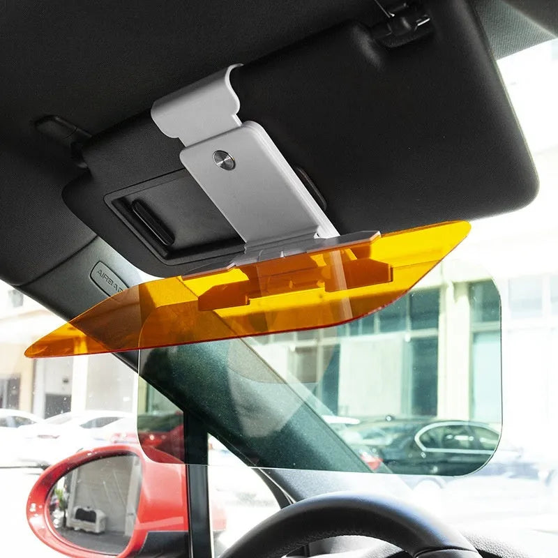 Car sun visor with anti-high beam goggles showing telescopic extension mechanism