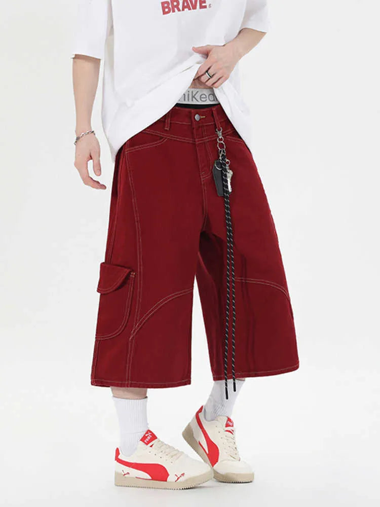 Retro multi-pocket denim workwear shorts in wide leg cropped design shown in red and black colours