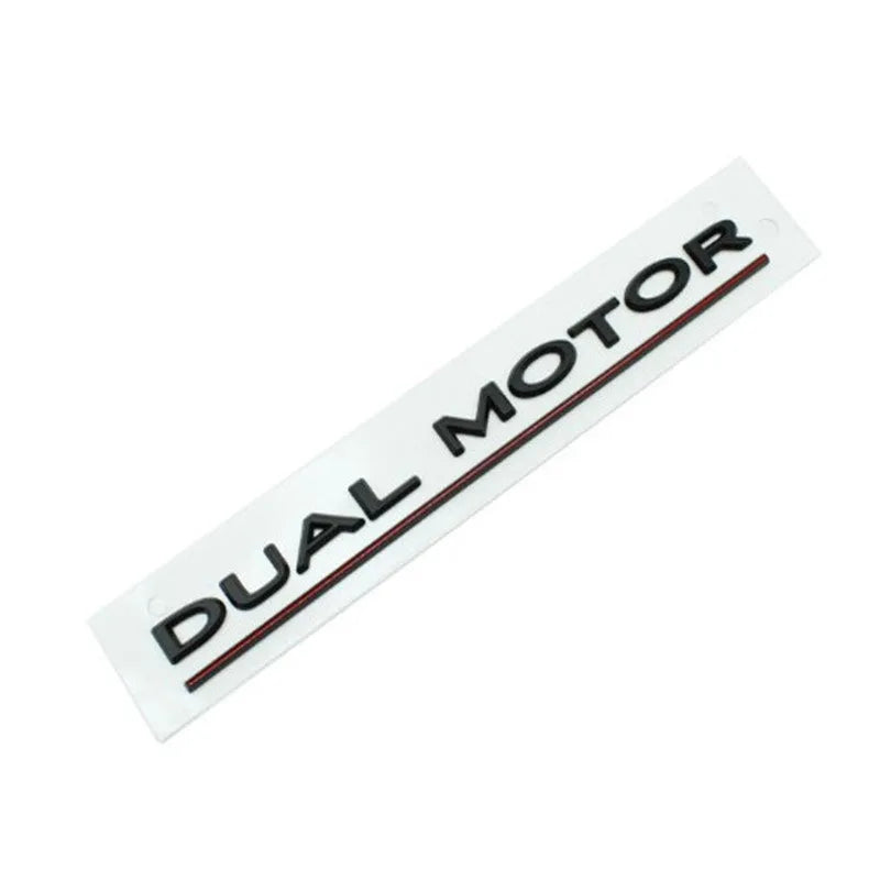 Tesla Model 3 Dual Motor bumper sticker in ABS plastic, shown in matte black with a black stripe, dimensions 19cm by 3cm.