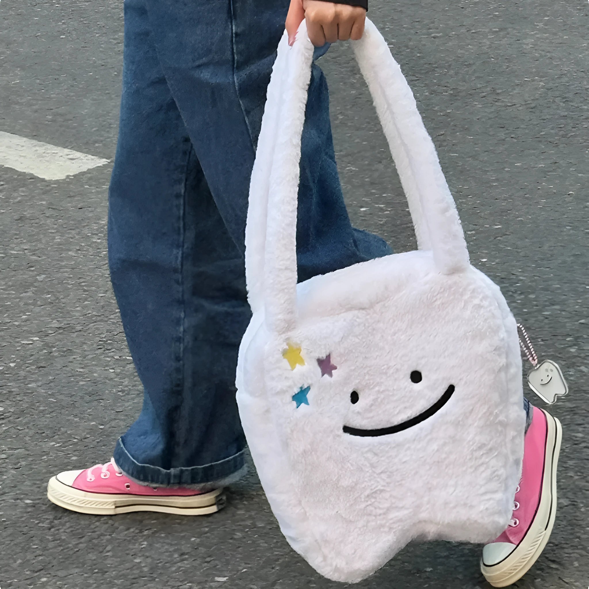 White crossbody shoulder bag with plush large tooth pattern and zipper closure