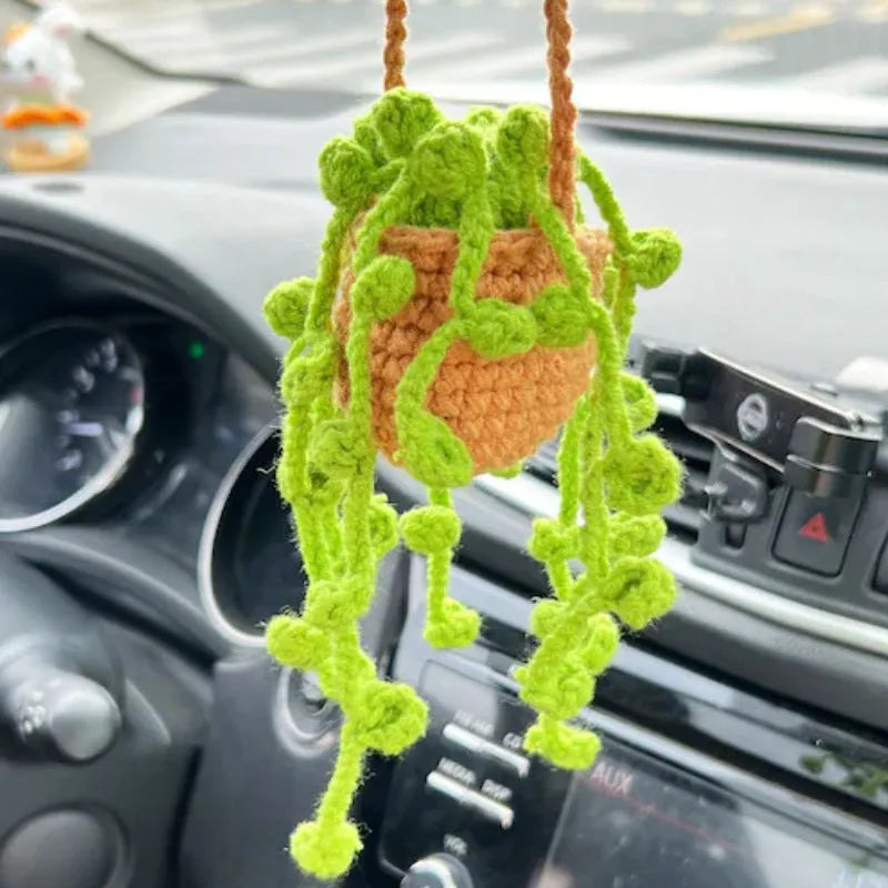 Green and white knitted car plant ornament with hanging rope for dashboard or mirror decoration