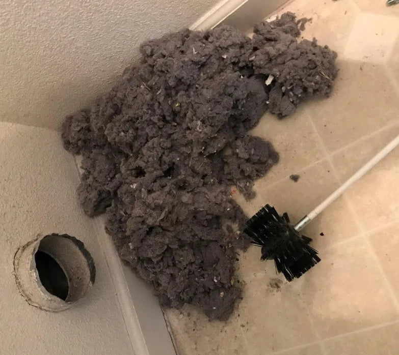 Flexible 600mm long dryer vent cleaning brush with nylon bristles and bendable rod.