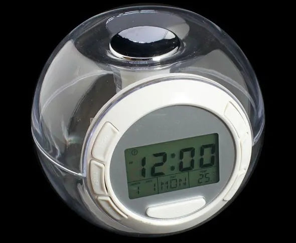 White colourful natural sound alarm clock with LCD display showing time and temperature