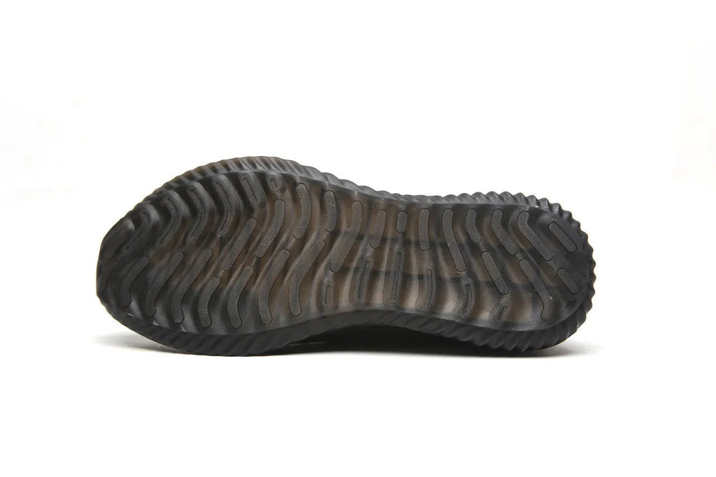 Men's black steel toe safety shoes with low-cut design on a work surface