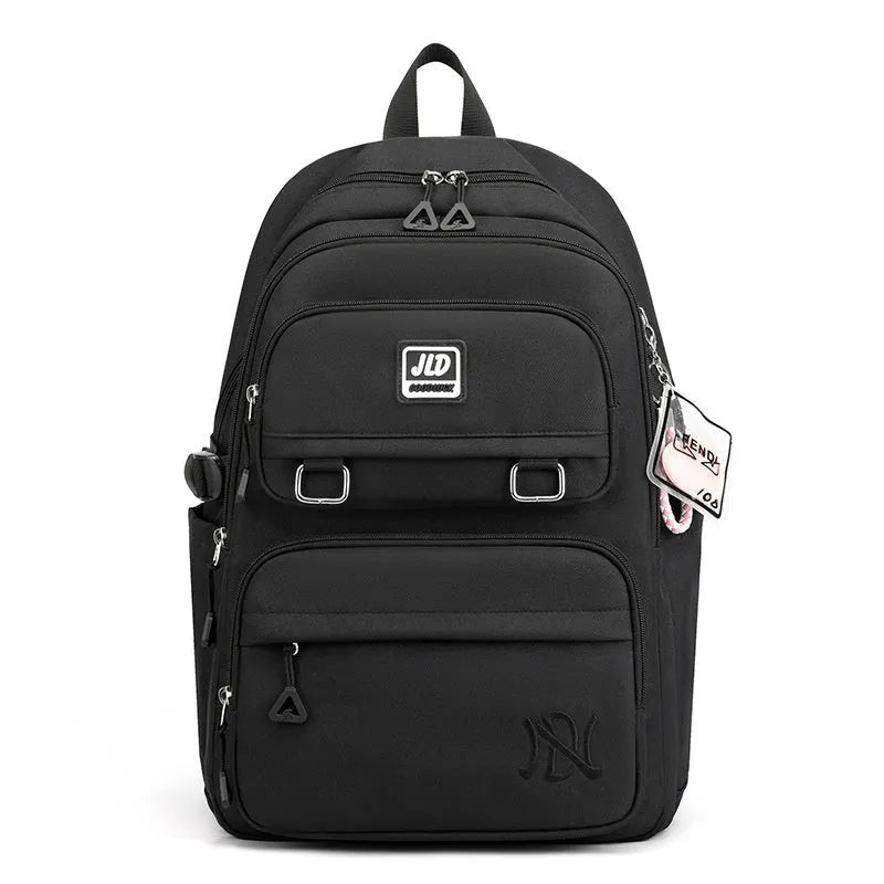 Girls large capacity nylon school backpack in assorted colours with physiological curve backplate