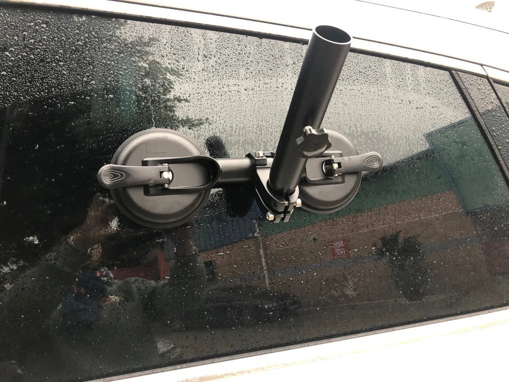 Black off-road car flagpole sucker base with round glass suction cup and rubber disc body.