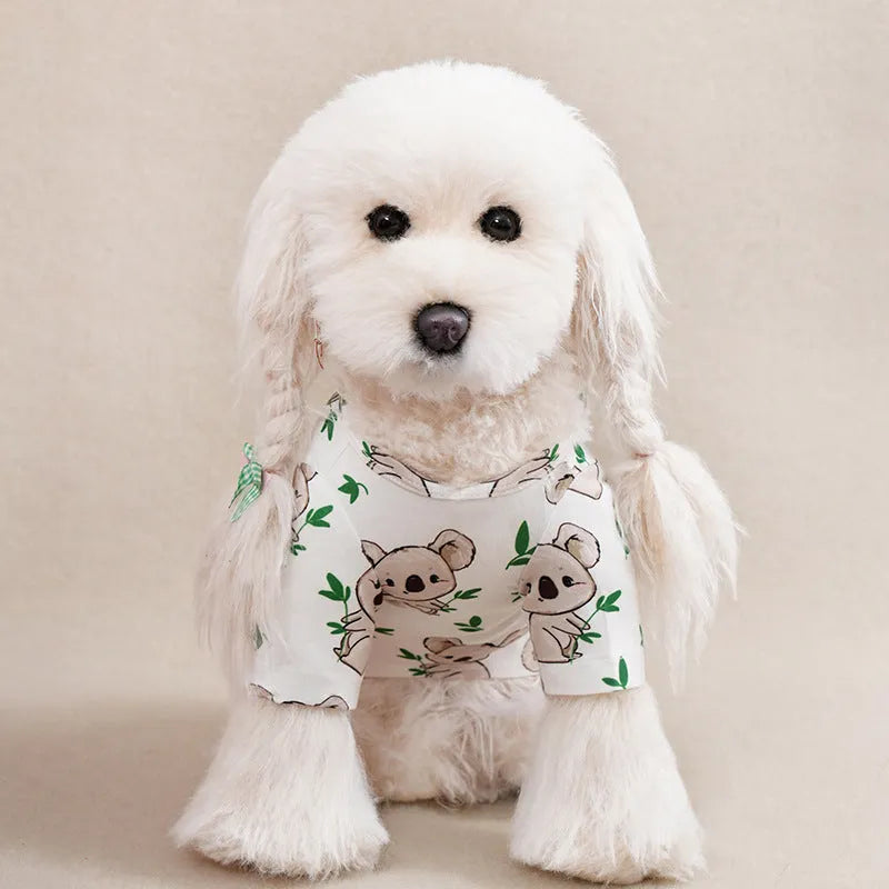 Small dog wearing a solid colour polyester t-shirt, showing the casual fit and full print design.