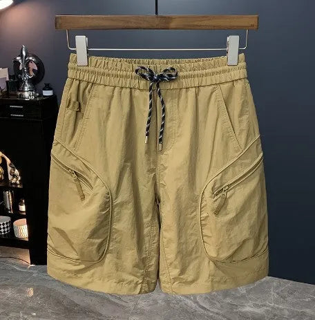 Men's camouflage pattern loose-fit cotton blend cargo shorts on a hanger