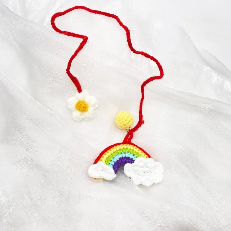 Handmade crocheted wool car pendant with rainbow flower pattern and cartoon avocado design in three colour options