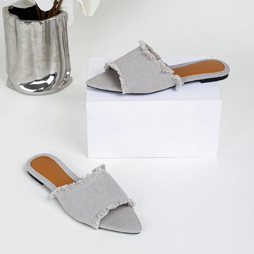 Women's denim slippers with tassel decoration in apricot colour with leather lining