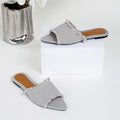 Women's denim slippers with tassel decoration in apricot colour with leather lining