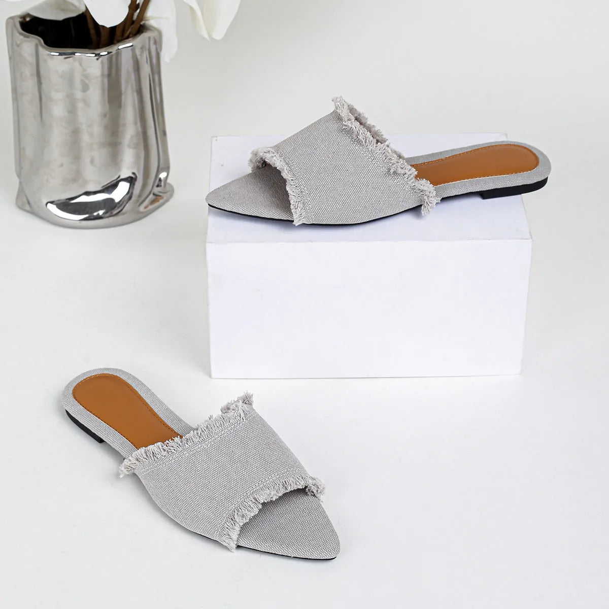 Women's denim slippers with tassel decoration in apricot colour with leather lining