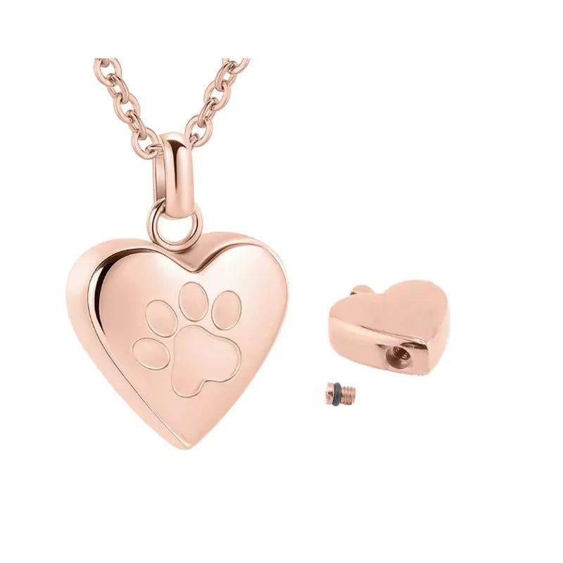Openable heart-shaped titanium steel cinerary necklace on a chain, shown in multiple colour finishes.