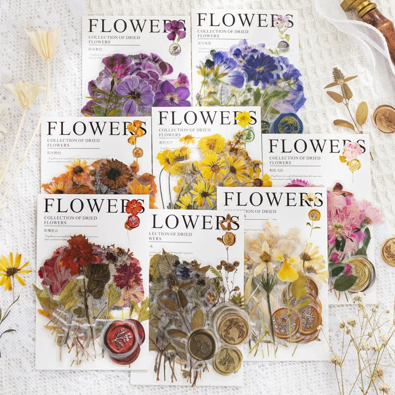 Package of colourful creative dried flower journal stickers showing eight different modern art style designs on clear PET sheets.