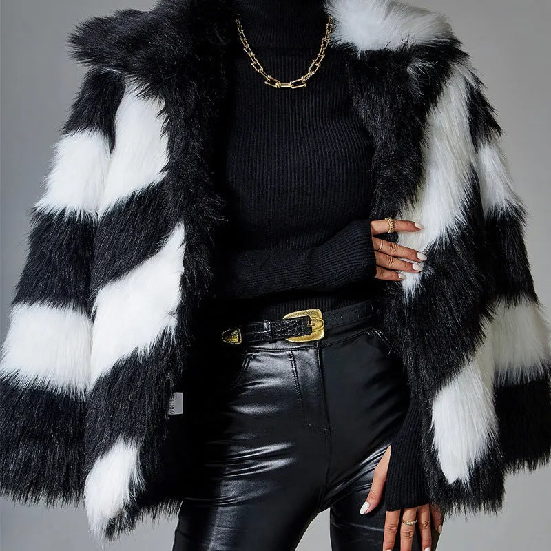 Women's faux fur coat with contrasting lapels and a full fur collar in a regular fit.
