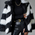Women's faux fur coat with contrasting lapels and a full fur collar in a regular fit.
