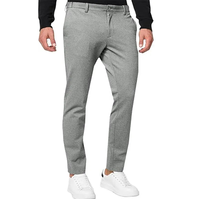 Men's slim-fit tapered chino trousers in khaki colour with pleated detail and zipper fly
