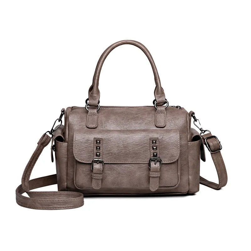 Large capacity vintage messenger bag in horizontal square shape, shown in available colours: blue, gray, camel, red, black, brown.