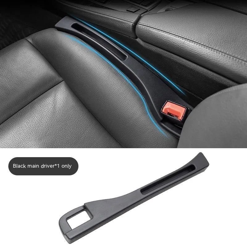 Black car gap storage box with handle placed between vehicle front seats