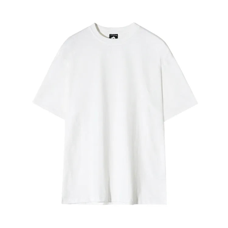 Men's slim fit cotton T-shirt in black solid colour, showing round neck and half sleeves.