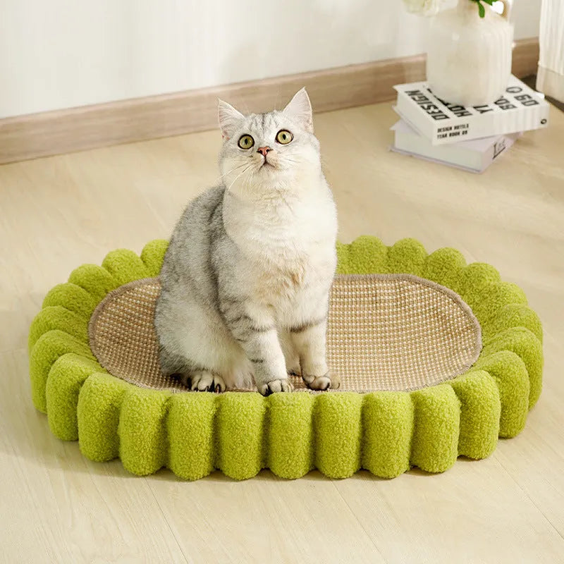 Green oval cat scratching pad and bed made from sisal material