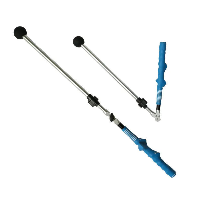 Golf folding swing trainer with black aluminium shaft and rubber grip on grass